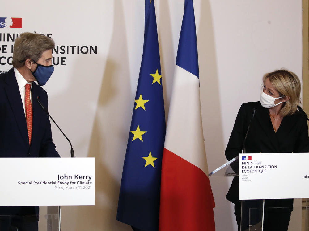 French Environment Minister Barbara Pompili and U.S. special envoy for climate John Kerry met in March. Kerry has been traveling around the world working to reestablish the U.S. as a trustworthy player in international climate diplomacy ahead of a summit in Washington, D.C., this week.