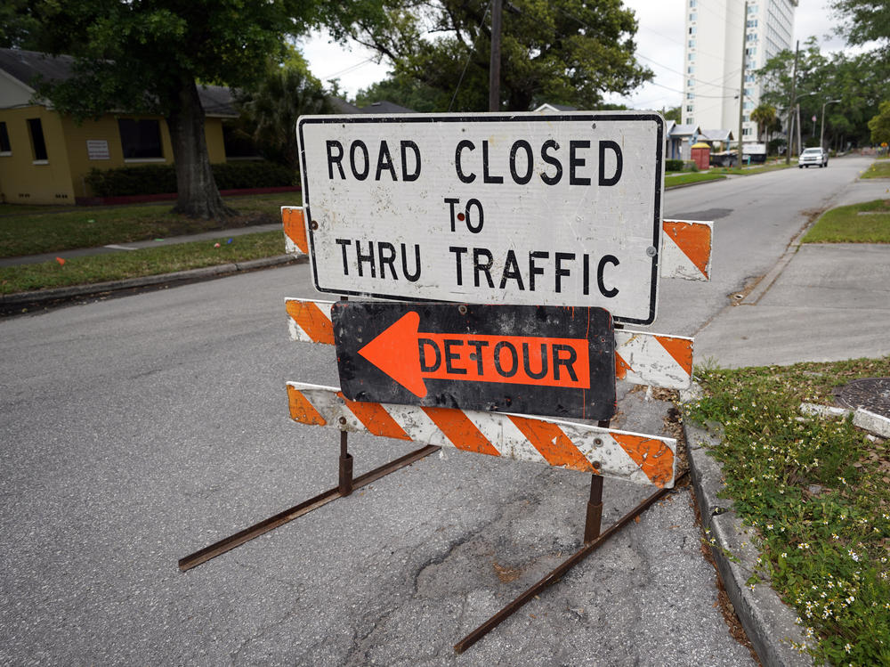 A city street is closed this month for repairs and upgrades in Orlando, Fla. As part of an infrastructure proposal by the Biden administration, $115 billion is earmarked to modernize bridges, highways and roads.
