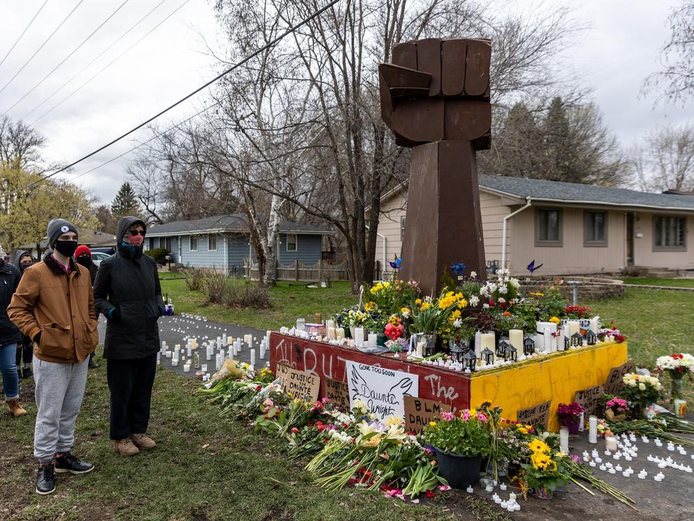 Mourners have built a makeshift memorial for Daunte Wright on the streets of Brooklyn Center, Minn., the quiet inner-ring suburb where police shot and killed Wright on April 11.