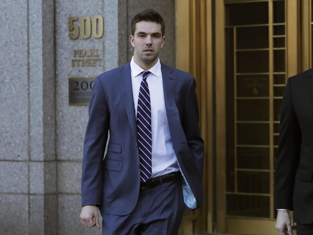 Billy McFarland, pictured leaving federal court in March 2018, was sentenced to six years in prison after pleading guilty to fraud charges related to the failed Fyre Festival. Ticket holders and event organizers reached a settlement in a class-action suit this week.