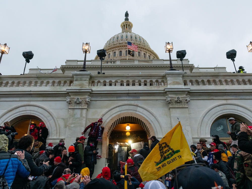 Rioters clash with law enforcement as they attempt to enter the U.S. Capitol on Jan. 6.