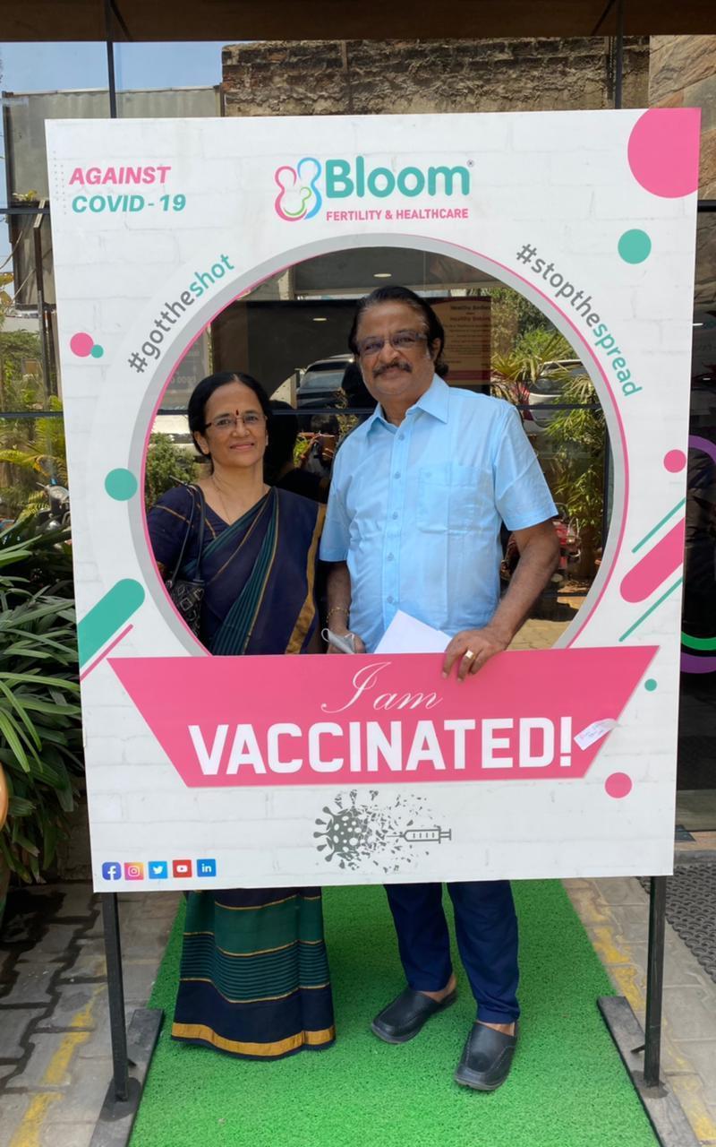 The author's parents, homemaker Ranee and movie house owner Chidambaram Valliappan posed at a vaccine selfie booth after getting their second doses in the southern Indian city of Chennai.