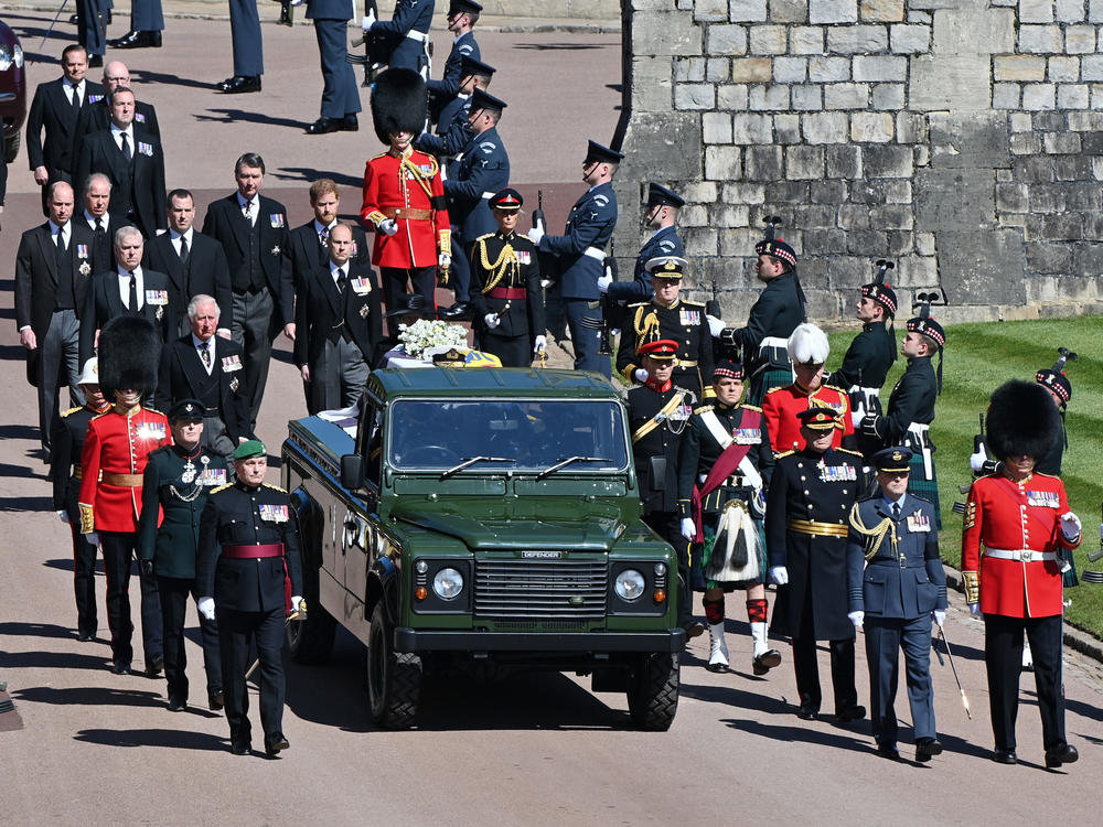 Members of the royal family follow Prince Philip's coffin during the ceremonial procession during his funeral at Windsor Castle on Saturday in Windsor, England.