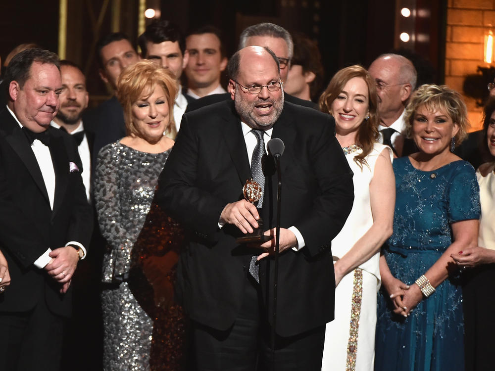 Producer Scott Rudin, center, and the cast of <em>Hello, Dolly!</em> accept the award for Best Revival of a Musical at the 2017 Tony Awards in New York City. Rudin says he's stepping back from his Broadway work.