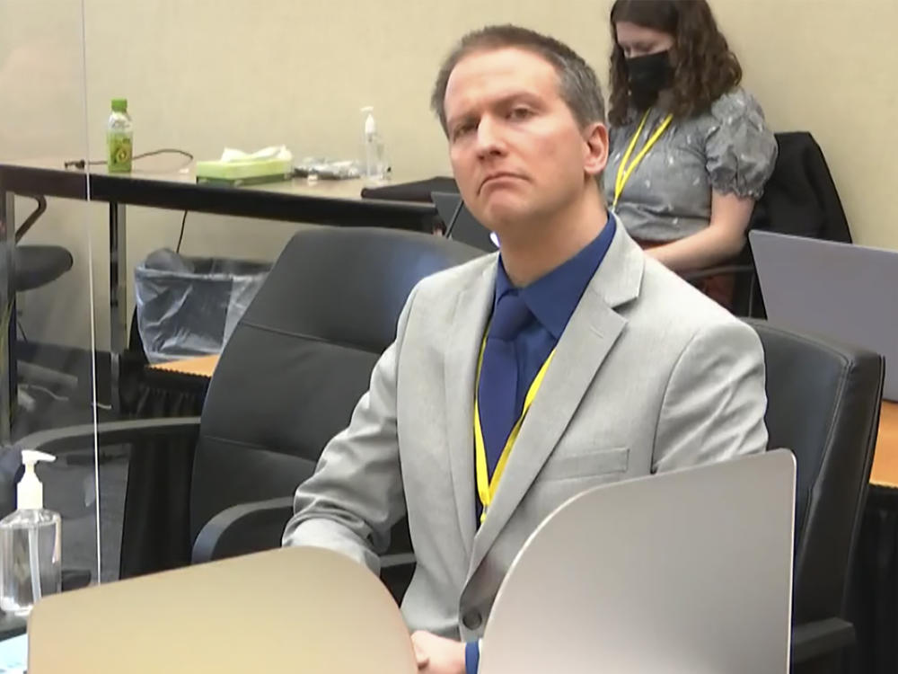 Former Minneapolis police officer Derek Chauvin listens to his defense attorney make closing arguments on Monday during his trial in the death of George Floyd.
