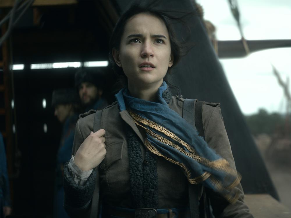 Cartographer Alina (Jessie Mei Li) maps her own fate in Netflix's fantasy series, <em>Shadow and Bone</em>.
