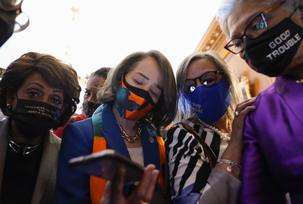 Members of the Congressional Black Caucus listen on Capitol Hill as the verdict was announced.