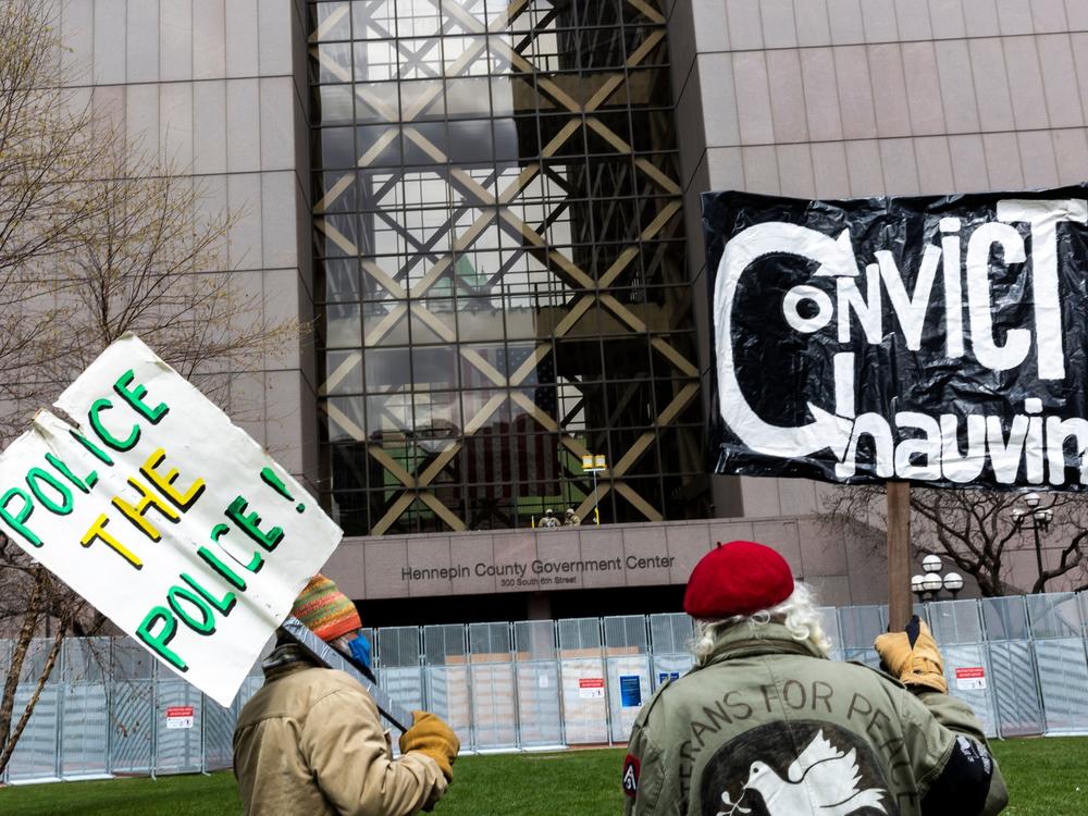 People gather outside the Hennepin County Courthouse in Minneapolis on Tuesday before the jury's decision returning guilty verdicts against former police officer Derek Chauvin.