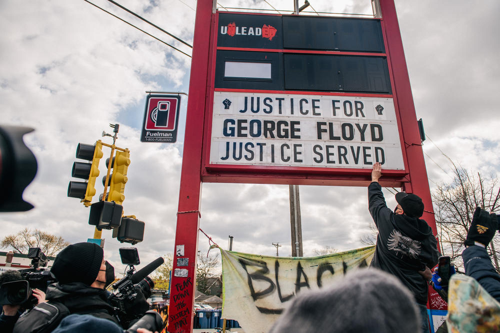 People celebrate the guilty verdict in the Derek Chauvin trail at the intersection of 38th Street and Chicago Avenue in Minneapolis.