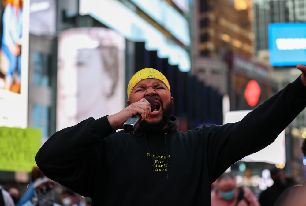 Black Lives Matter protesters gather in Times Square in New York City after the verdict.
