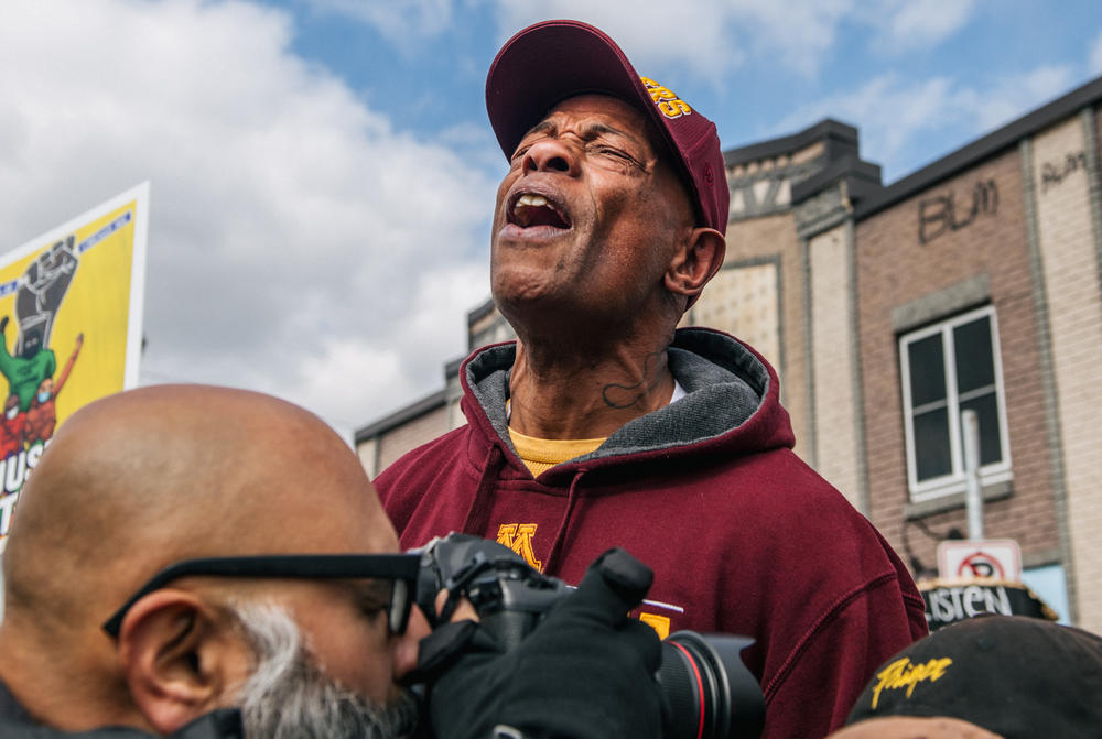 People celebrate after hearing the verdict in the trial of Derek Chauvin, at the intersection of 38th Street and Chicago Avenue in Minneapolis, now known as George Floyd Square.