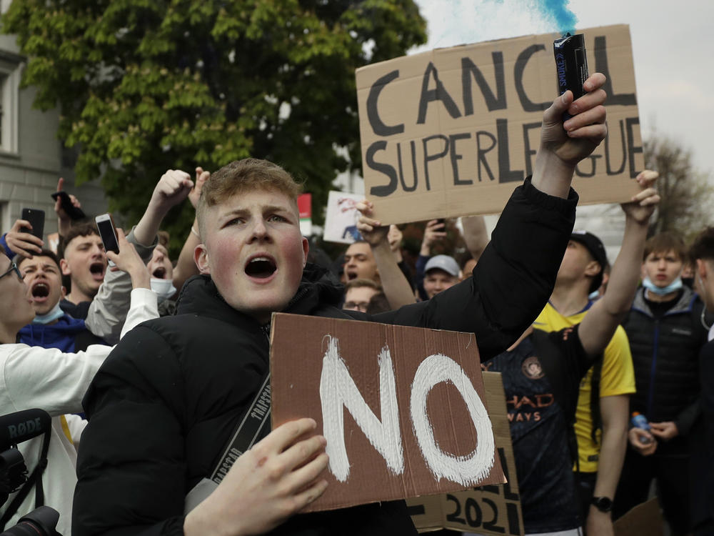 Chelsea fans protest outside Stamford Bridge stadium in London, against Chelsea's decision to be included amongst the clubs attempting to form a new European Super League.