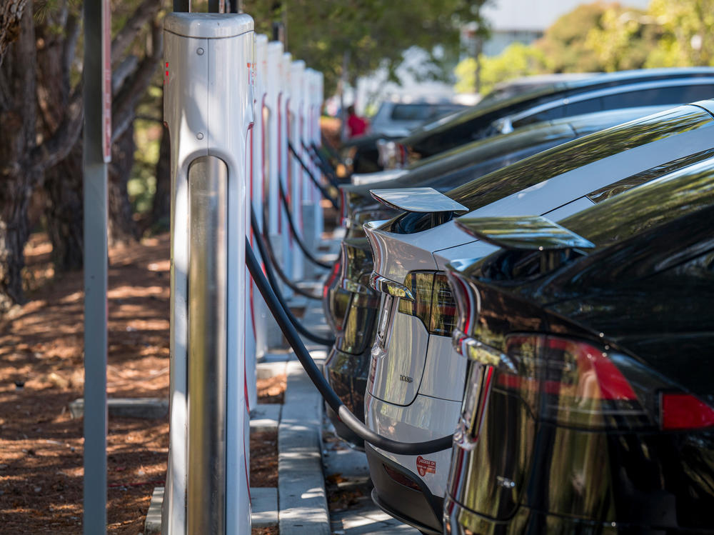 Electric vehicles at a charging station last year in San Mateo, Calif. The governors of 12 states, including California, have called on President Biden to order that all cars and light trucks sold in the U.S. after 2035 be zero-emission vehicles.