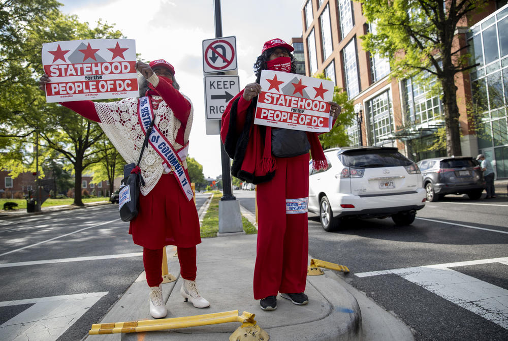 In Ward 6 at Maine Ave SW in front of The Wharf, Emma P. Ward, left, (Ms. Senior District of Columbia 2011) and Joyce Robinson-Paul show their support for D.C. statehood.