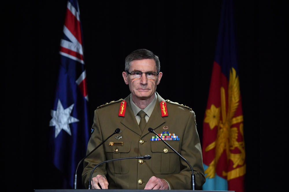 Chief of the Australian Defence Force Gen. Angus Campbell delivers the findings from the military's Afghanistan inquiry on Nov. 19, 2020, in Canberra, Australia. The landmark report has shed light on alleged war crimes by Australian troops serving in Afghanistan.