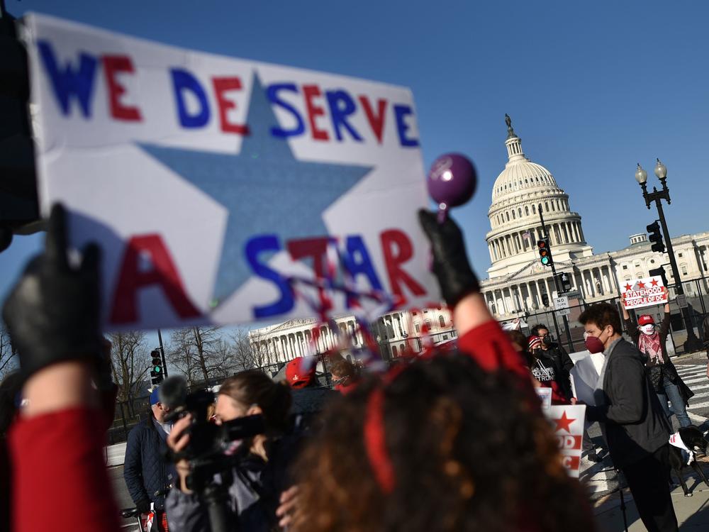 Activists take part in a March rally near the U.S. Capitol in support of statehood for Washington, D.C. One month later, the House of Representatives passed a bill 216-208 that would make D.C. the nation's 51st state.