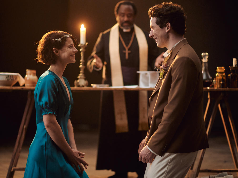 Jessie Buckley and Josh O'Connor as Romeo and Juliet, and Lucian Msamati as Friar Laurence, in the new <em>Romeo & Juliet </em>on PBS's <em>Great Performances</em>.