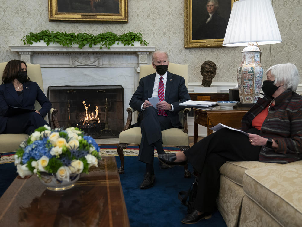 President Biden meets with Treasury Secretary Janet Yellen and Vice President Harris in the Oval Office on Jan. 29.