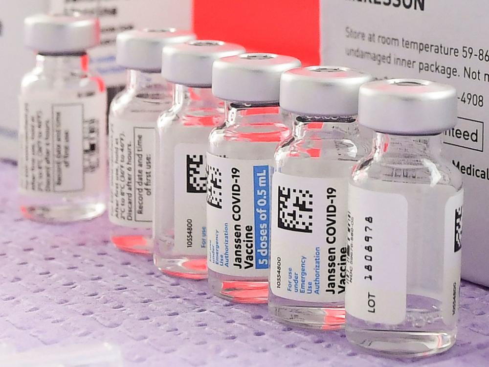 Bottles of the single-dose Johnson & Johnson COVID-19 vaccine await transfer into syringes for administering last month in Los Angeles.