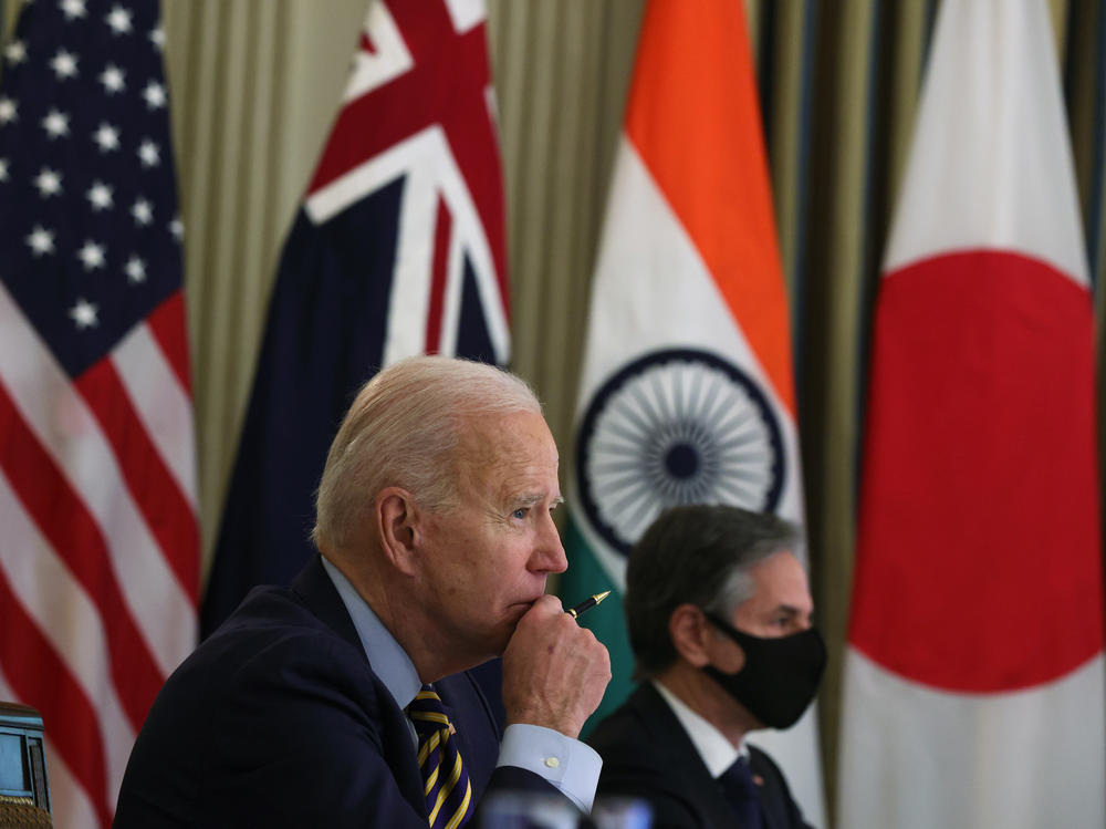 President Biden and Secretary of State Antony Blinken participate in a virtual meeting with world leaders on March 12 at White House.