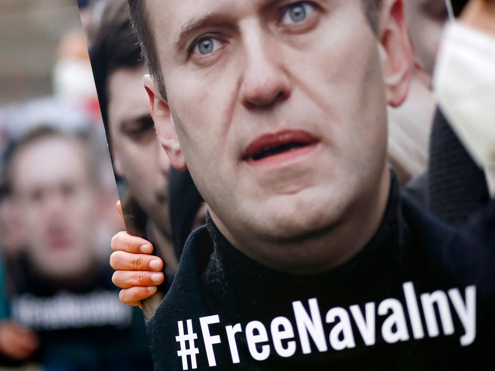 Activists from Amnesty International demonstrate Saturday outside the Russian Embassy in Berlin, calling for the release of Kremlin critic Alexei Navalny. On Monday, a Russian court ordered the temporary suspension of Navalny's political network.