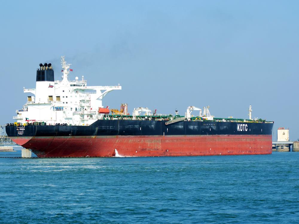 Tankers unload imported crude oil at the Qingdao crude oil terminal in east China's Shandong Province in February. A tanker anchored off the port was reportedly hit Tuesday by another vessel, causing an oil spill in the Yellow Sea.