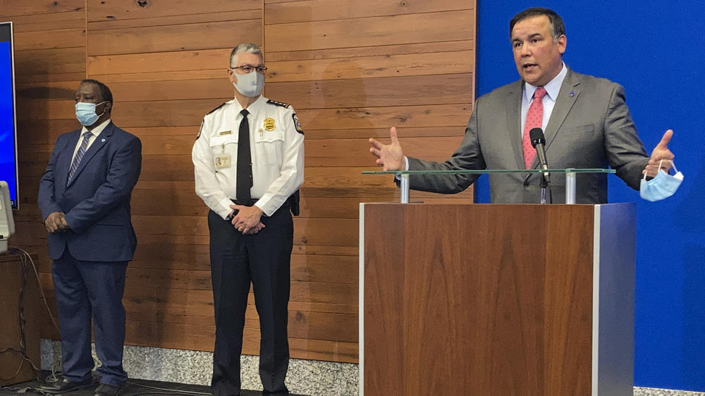 Columbus Mayor Andrew Ginther (right) speaks during a news conference last week about the fatal police shooting of 16-year-old Ma'Khia Bryant.
