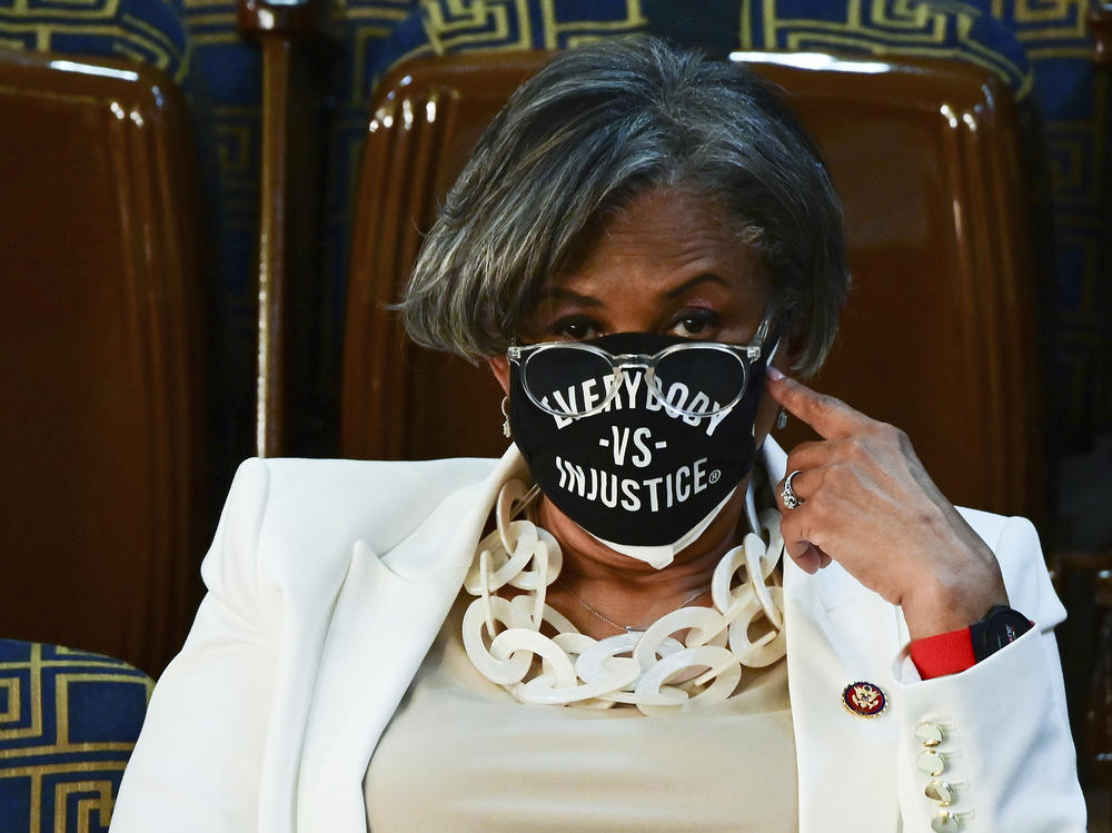 Rep. Brenda Lawrence of Michigan and other members of Congress wore masks in attendance at the president's address, which included discussion of systemic racism, police reform and hate crimes legislation.