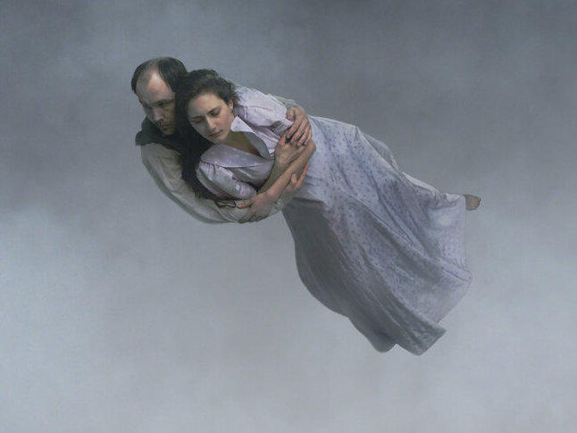 <em>About Endlessness</em> opens with the visual of a couple (Jan-Eje Ferling and Tatiana Delaunay) floating through gray, cloudy skies. <a href=