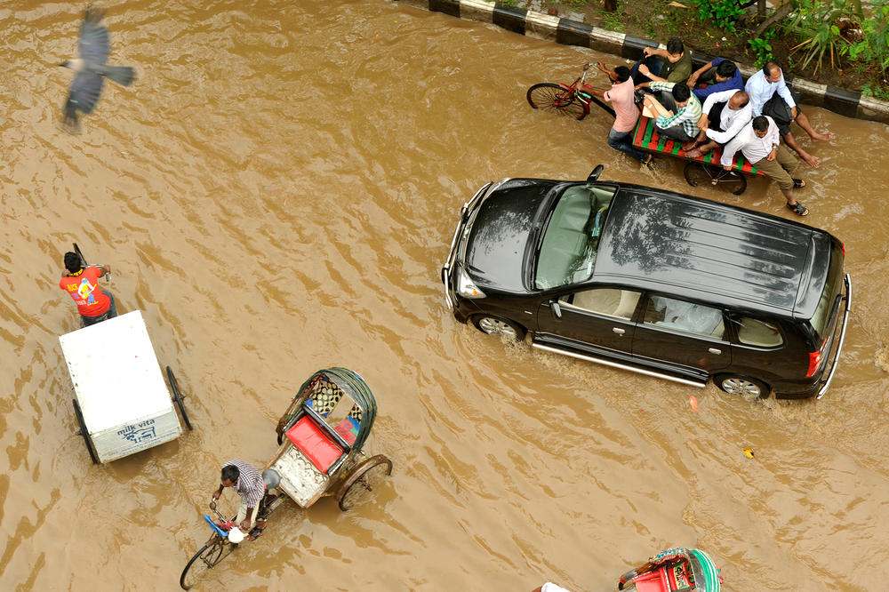 Children are at risk of drowning when floods strike. Above: Monsoon rains caused this February 2014 flood in Dhaka, the capital of Bangladesh.