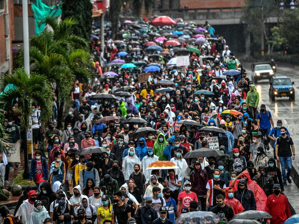 Demonstrators take part in the second day of protests in Medellín, Colombia, on Thursday. Unions, teachers, civil organizations, indigenous people and other groups reject the tax proposal.