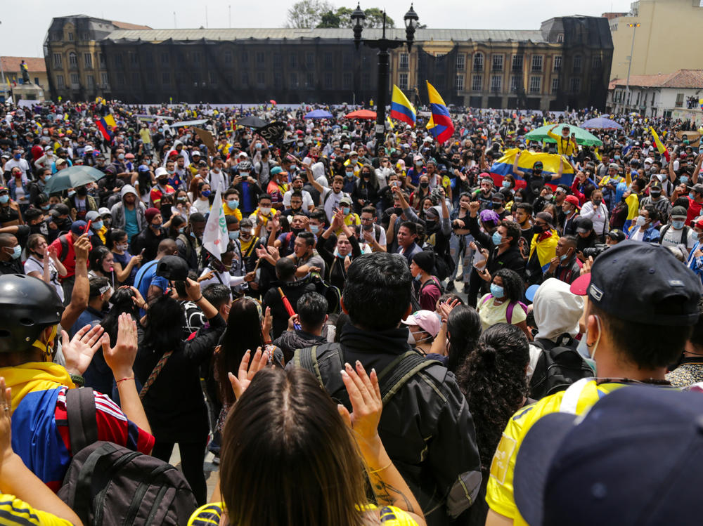 Protesters attend a May Day rally against proposed tax changes in Bogotá on Saturday.