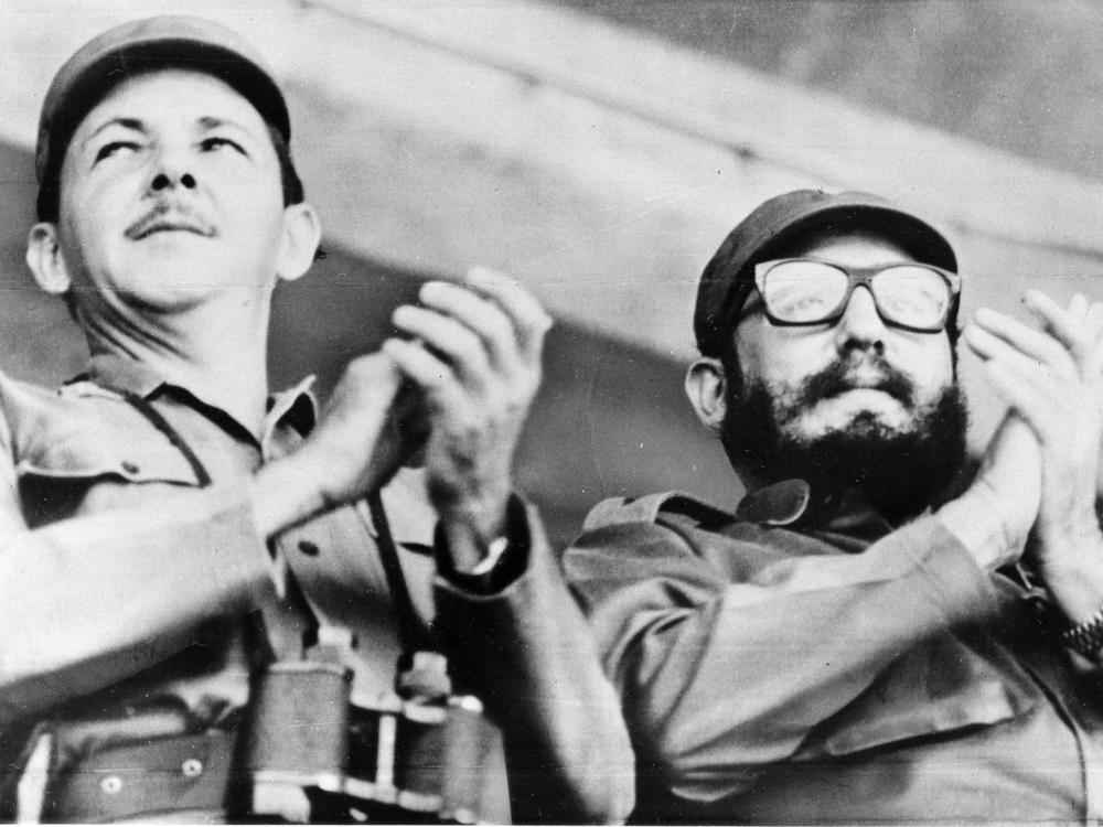 Cuban leader Fidel Castro (right) and his brother Raúl Castro, the head of the military, at a 1964 event in Santiago, Cuba. New details of the first CIA attempt to kill the Castros — a 1960 plot against Raúl — have recently emerged.