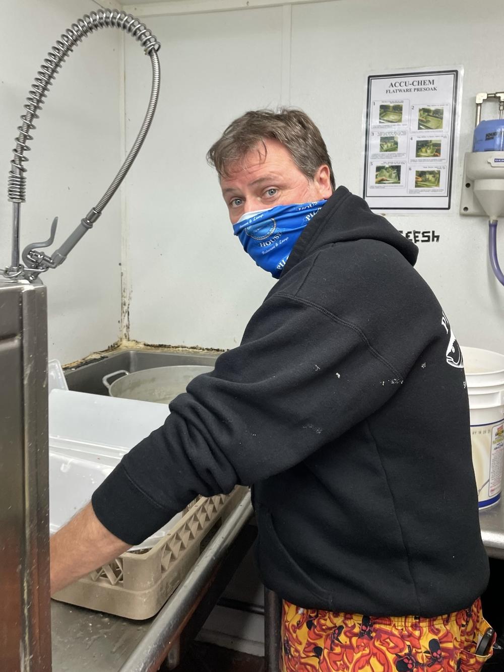 Bob Jarvis, owner of the Pilot House restaurant in Sandwich, Mass., is pitching in to wash dishes, cook and do anything else with staffing so low.