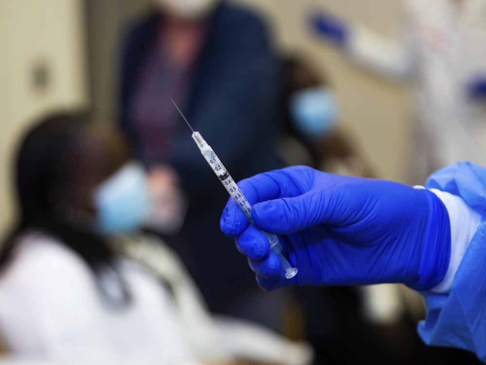 A doctor prepares to administer a vaccine injection at New York-Presbyterian Lawrence Hospital in Bronxville, N.Y., in January. The Food and Drug Administration has approved emergency use authorization of the Pfizer/BioNTech vaccine for patients ages 12 to 15.