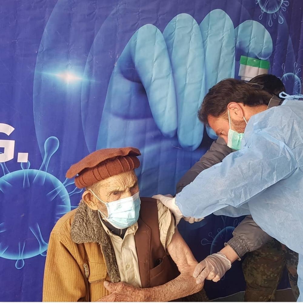 Alim gets his COVID shot.