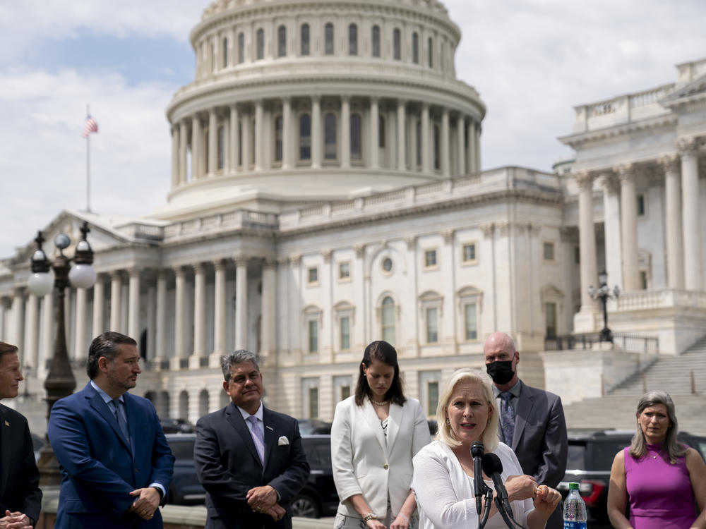 Sen. Kirsten Gillibrand, D-N.Y., says there are now enough votes in the Senate to pass legislation to move cases of sexual assault in the military out of the chain of command. Above, Gillibrand talks about the bill outside the U.S. Capitol last week.