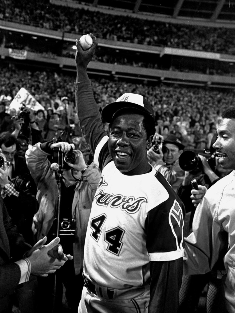 Vin Scully was the play-by-play announcer for Hank Aaron's 715th record-setting career home run against the L.A. Dodgers in 1974. Scully narrated some of the most memorable moments in baseball history since he began his career calling Brooklyn Dodgers games in 1950.