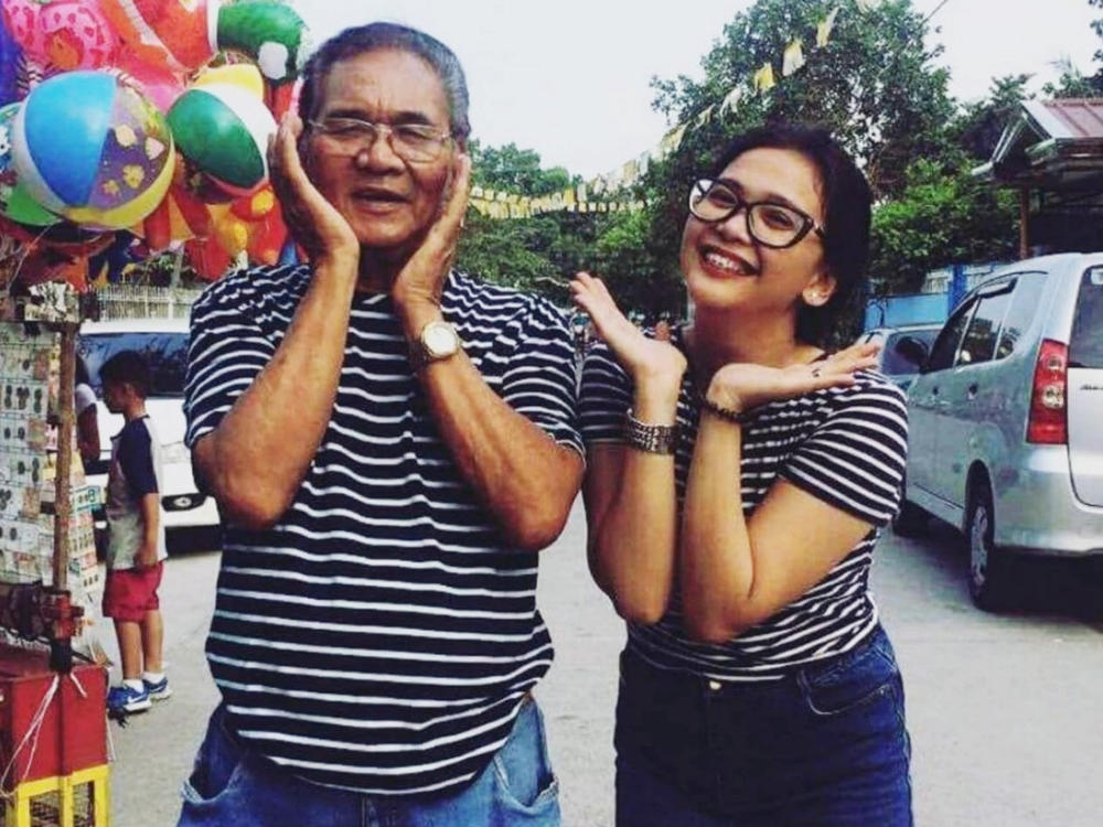 Nardo Samson posing with granddaughter Kiara Bautista, May 2017.