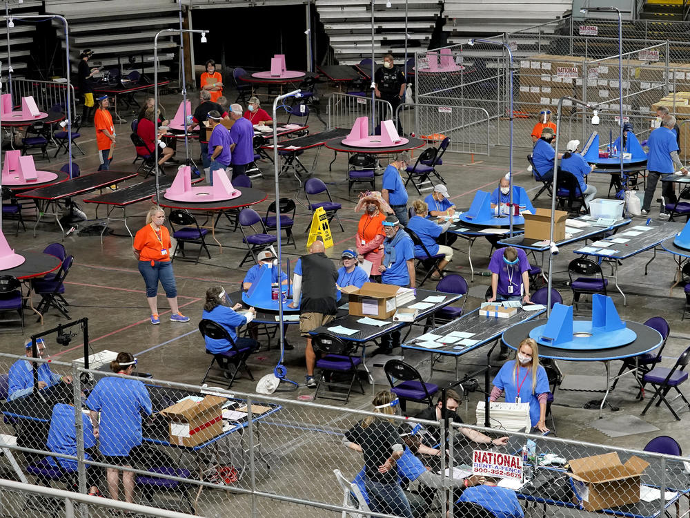 Maricopa County ballots cast in the 2020 general election are examined and recounted Thursday by contractors hired by the Republican-led Arizona Senate.