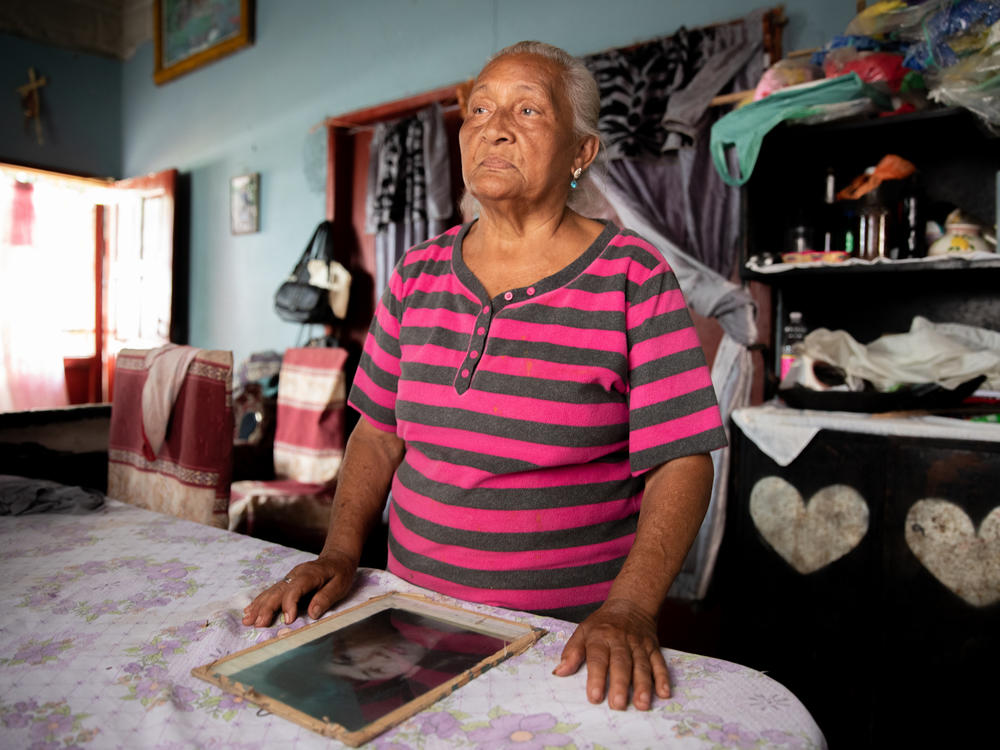 Edita Maldonado hosts a weekly radio program that tries to reunite migrants who disappeared on the dangerous trek north with their loved ones back in Progreso, Honduras.