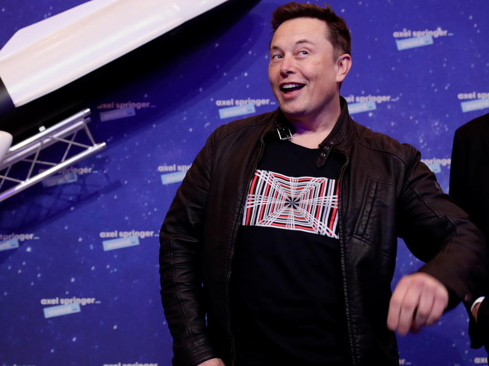 Tesla CEO Elon Musk strikes a pose at a December 2020 awards ceremony in Germany. This weekend, he hosted NBC's <em>Saturday Night Live</em>.
