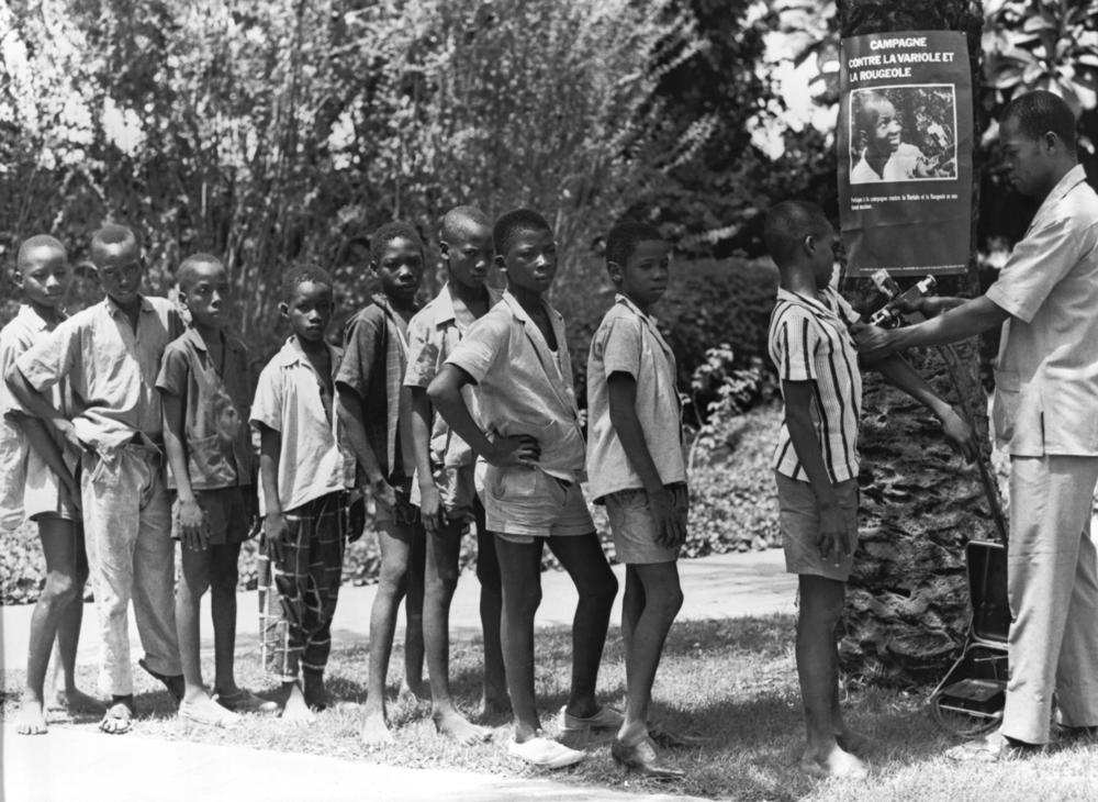 Boys stand in line to be vaccinated through the smallpox eradication and measles control program in West Africa in 1968. While smallpox has been eradicated, measles remains a leading cause of death among young children, even though a safe and cost-effective vaccine is available, the World Health Organization says.