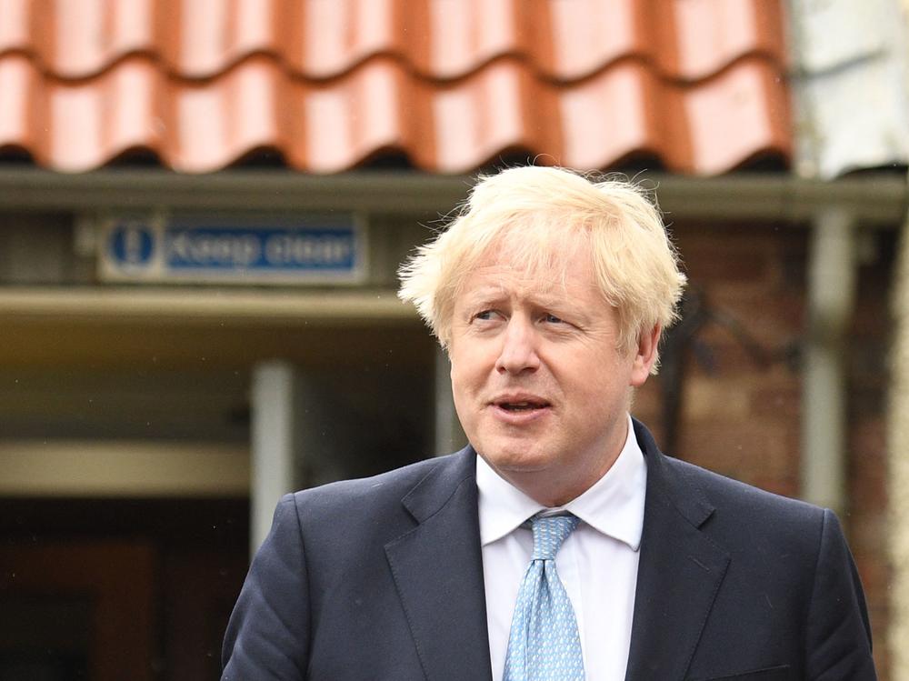 Britain's Prime Minister Boris Johnson, pictured Friday, celebrated his party's victory in a local election. Johnson's Conservatives fared well in local and regional elections.