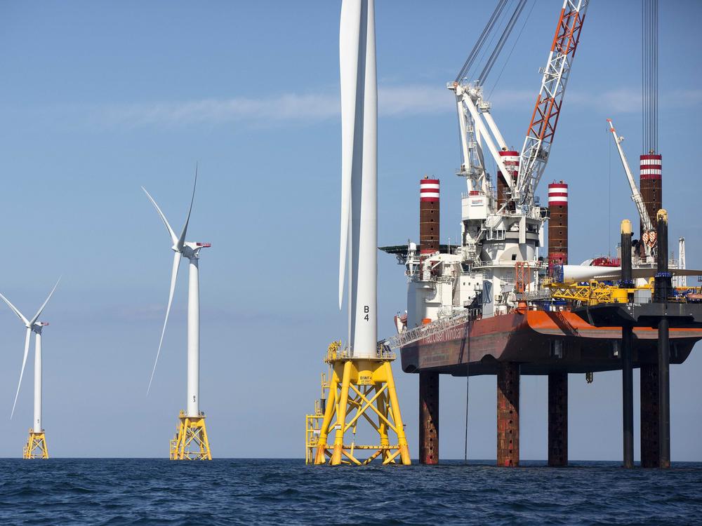 A lift boat and wind turbines off Block Island, R.I., in 2016. Approval of the country's first large-scale wind farm off Martha's Vineyard signals a major shift in the clean energy landscape.