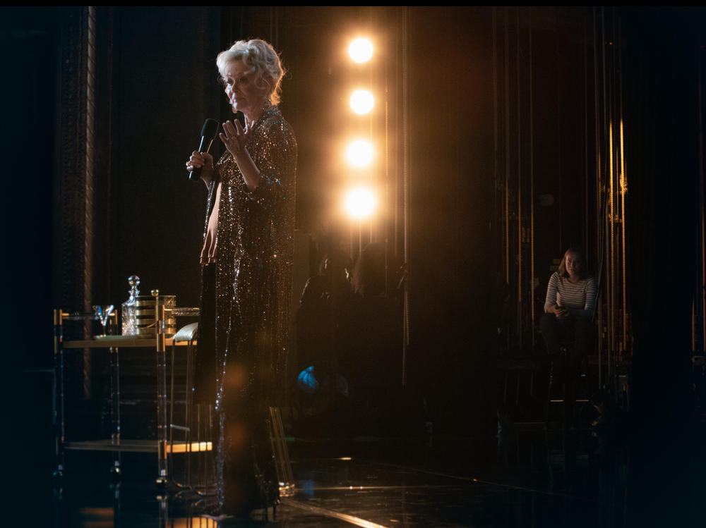 L to R: Legendary comic Deborah Vance (Jean Smart) performs while her reluctant assistant Ava (Hannah Einbinder) literally waits in the wings on <em>Hacks</em>.