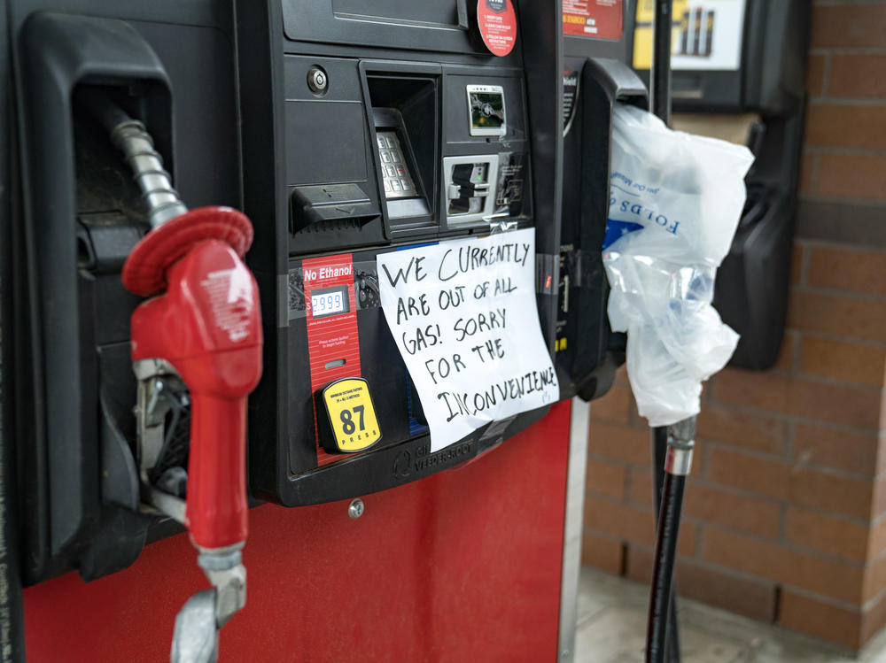 Cars line up Tuesday at a QuikTrip in Atlanta. Continued panic-buying is leading to shortages at gas stations across the Southeast after a hack attack shut down a critical pipeline.
