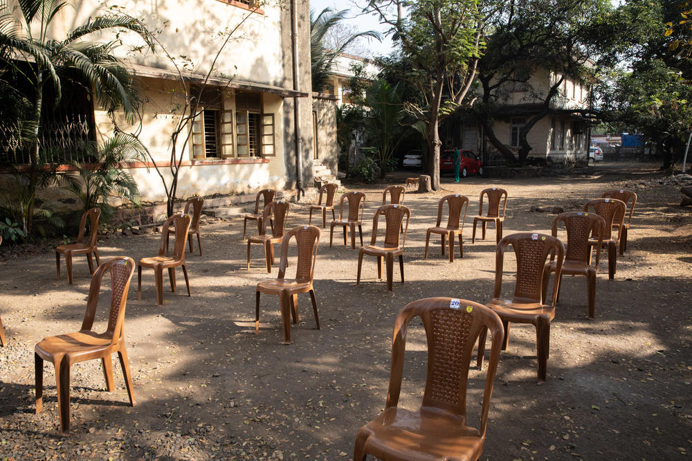 The Palghar Rural Hospital in India has chairs lined up — at a safe distance — for vaccine patients. But so far there are more chairs than vaccine candidates.