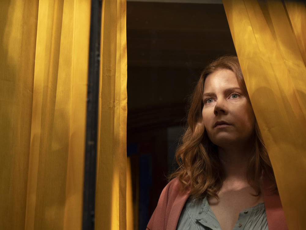 Amy Adams stars as Anna Fox in the Netflix film <em>The Woman In The Window</em>.