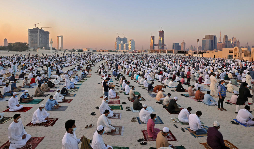 Muslim worshippers perform the Eid al-Fitr morning prayer at Dubai's Eid Musalla in the Gulf emirate's old port area.